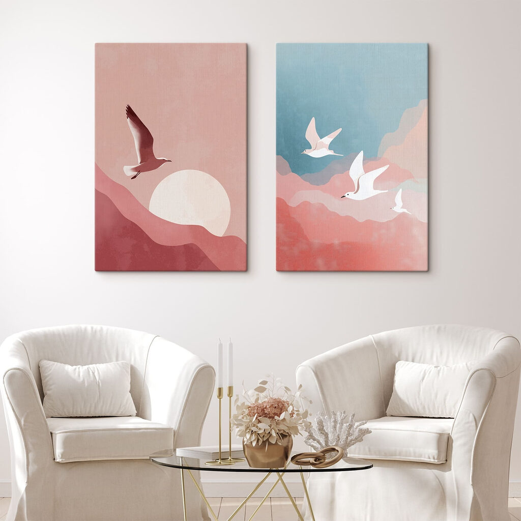Two birds flying in the sky