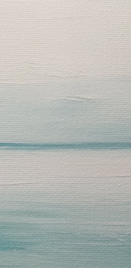 Calm ocean with a cloudy sky